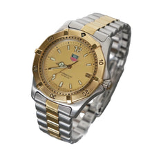 Load image into Gallery viewer, Two-tone watch with gold and silver band on a gray background
