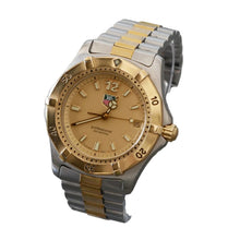 Load image into Gallery viewer, Two-tone silver and gold watch on a gray background
