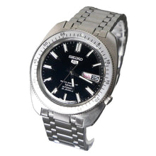 Load image into Gallery viewer, Seiko watch with black dial and silver metal bracelet on a gray background