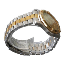Load image into Gallery viewer, Two-tone silver and gold watch on a clear stand with a gray background