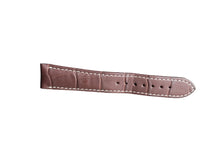 Load image into Gallery viewer, Brown leather watch strap with white stitching on a gray surface
