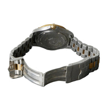 Load image into Gallery viewer, Close-up of a silver and black watch on a gray surface
