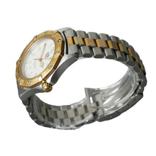 Load image into Gallery viewer, Silver and gold watch on a stand with a gray background
