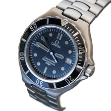 Load image into Gallery viewer, Omega watch with blue dial and silver metal strap on a gray background
