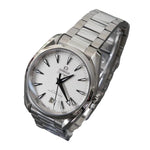 Silver Omega watch on a gray background