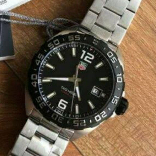 Tag Heuer, Formula 1 watch. Black dial, chrome strap